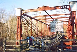 [photo, Bollman Iron	Truss Bridge at	Savage Mill, 8600 Foundry St., Savage, Maryland]