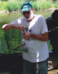 [photo, Fisherman on Little Gunpowder Falls near Jerusalem Mill Historic Village, Kingsville (Harford County), Maryland]